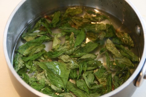 Basil leaves in sugar syrup