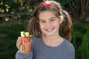 Ashley Ferbas and her canning jar of vegetables