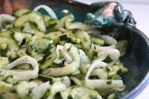 Swedish Cucumber Salad in a glazed pottery serving dish