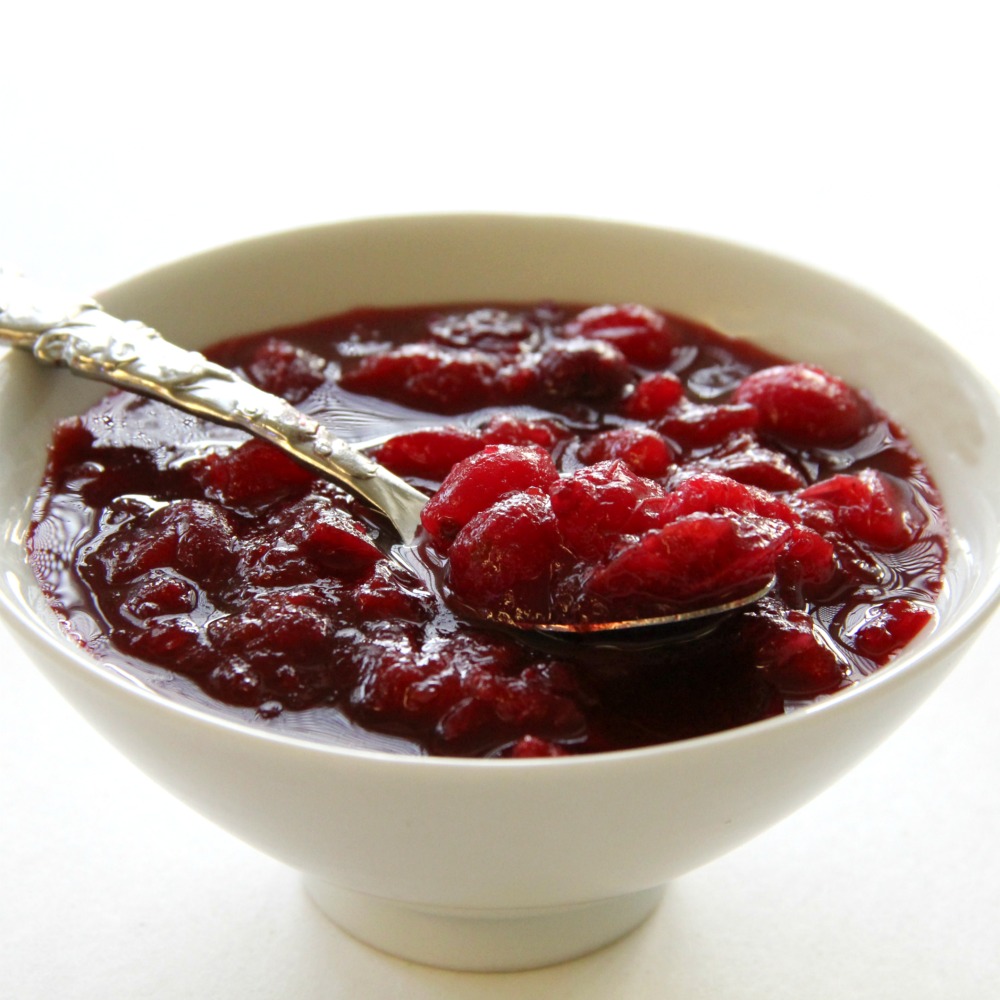 Best Ever Homemade Cranberry Sauce in a white bowl against a white background