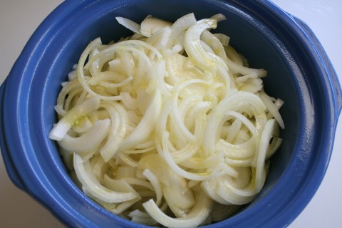 Sliced onions in a Crock-Pot from Shockinglydelicious.com
