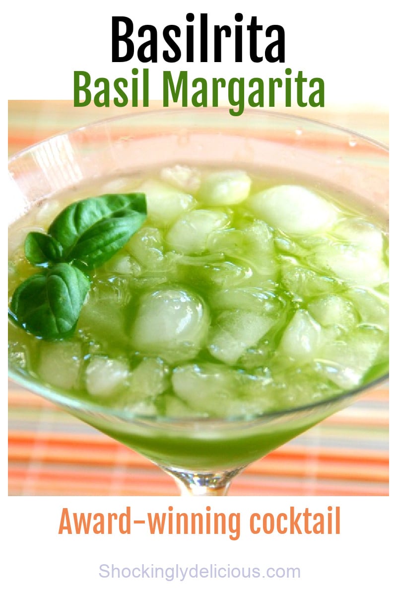 Basilrita basil margarita cocktail in a martini glass on ShockinglyDelicious.com