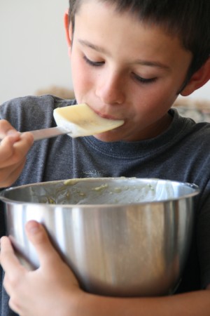 Boy eating batter