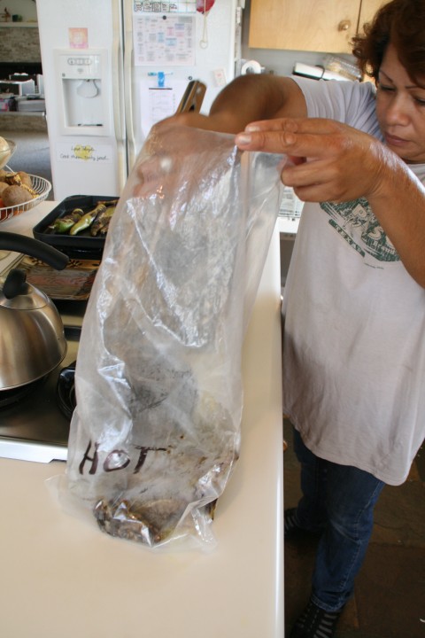 Hatch chiles into a plastic bag