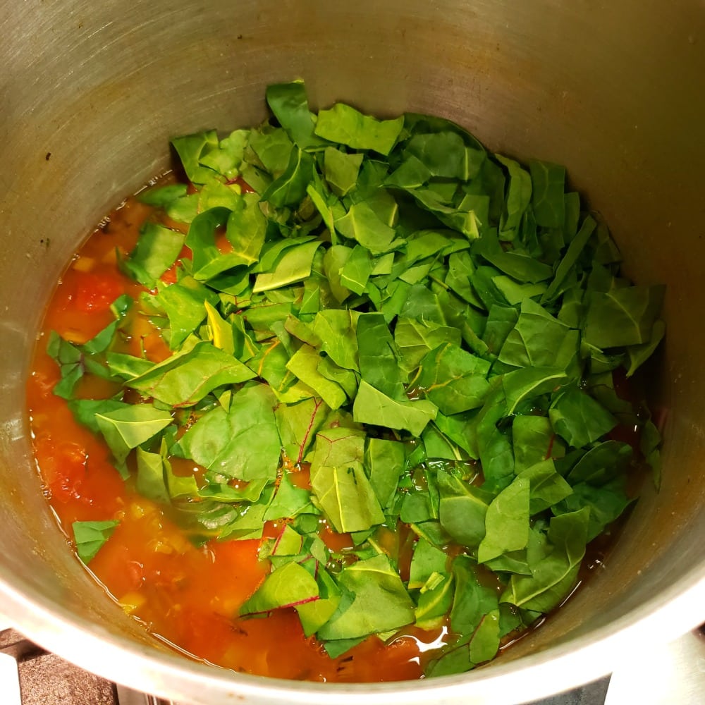 Add Swiss Chard to the soup pot