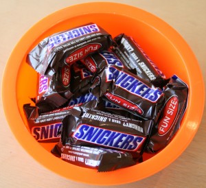 Snickers Bars in an orange bowl