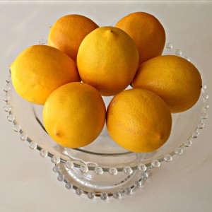 Meyer lemons on a cakestand