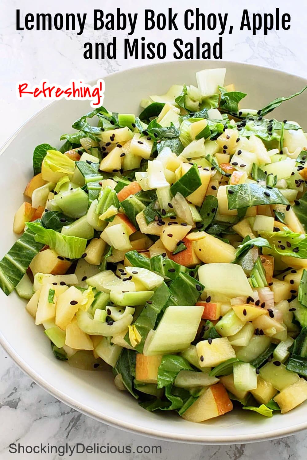 Lemony Baby Bok Choy, Apple and Miso Salad with recipe title superimposed on top of the photocom