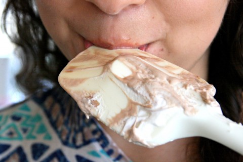 Licking the spoon from Nutella Meringues