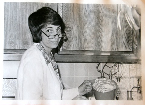 Helen Reinhold cooking, circa 1970s