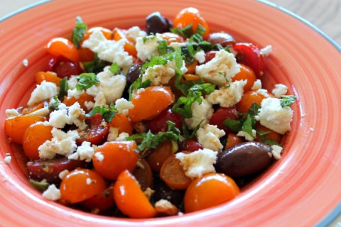 Cherry Tomato and Israeli Feta Salad is a perfect marriage of summer-ripe cherry tomatoes, zingy Israeli feta cheese and salty olives. Mint is the wild card, but don't leave it out. You could make a meal of this when tomatoes are in season!