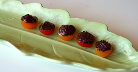 Tapenade Tomatoes on a leaf serving plate