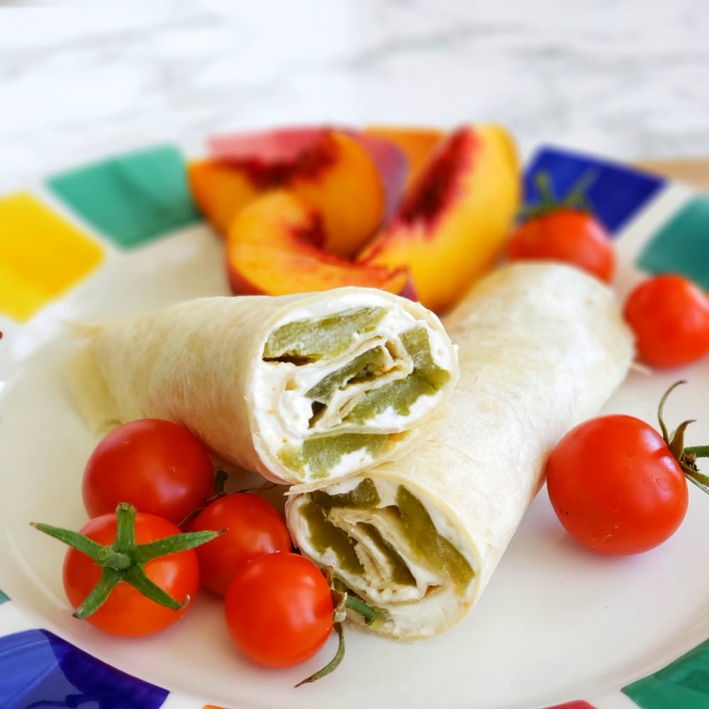 POOR MAN'S BURRITO: A Hatch chile wrapped up with garlicky cream cheese in a flour tortilla becomes a Poor Man’s Burrito, perfect for tailgating, any party, lunch or a snack!