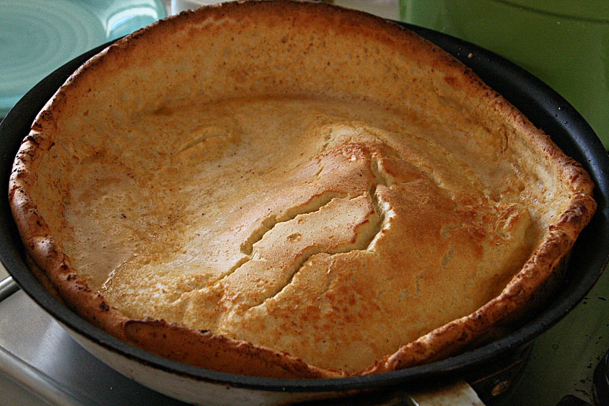 Dutch Baby Pancake in a skilled out of the oven and deflated