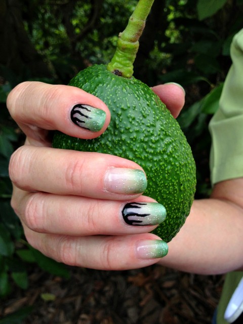 Jan DeLyser holds a Haas avocado on Shockingly Delicious