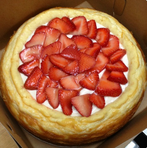 Blue Ribbon Meyer Lemon Mascarpone Cheesecake with fresh strawberries on top