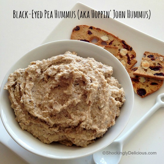 Black-Eyed Pea Hummus (Hoppin' John Hummus) in a white bowl on a white plate