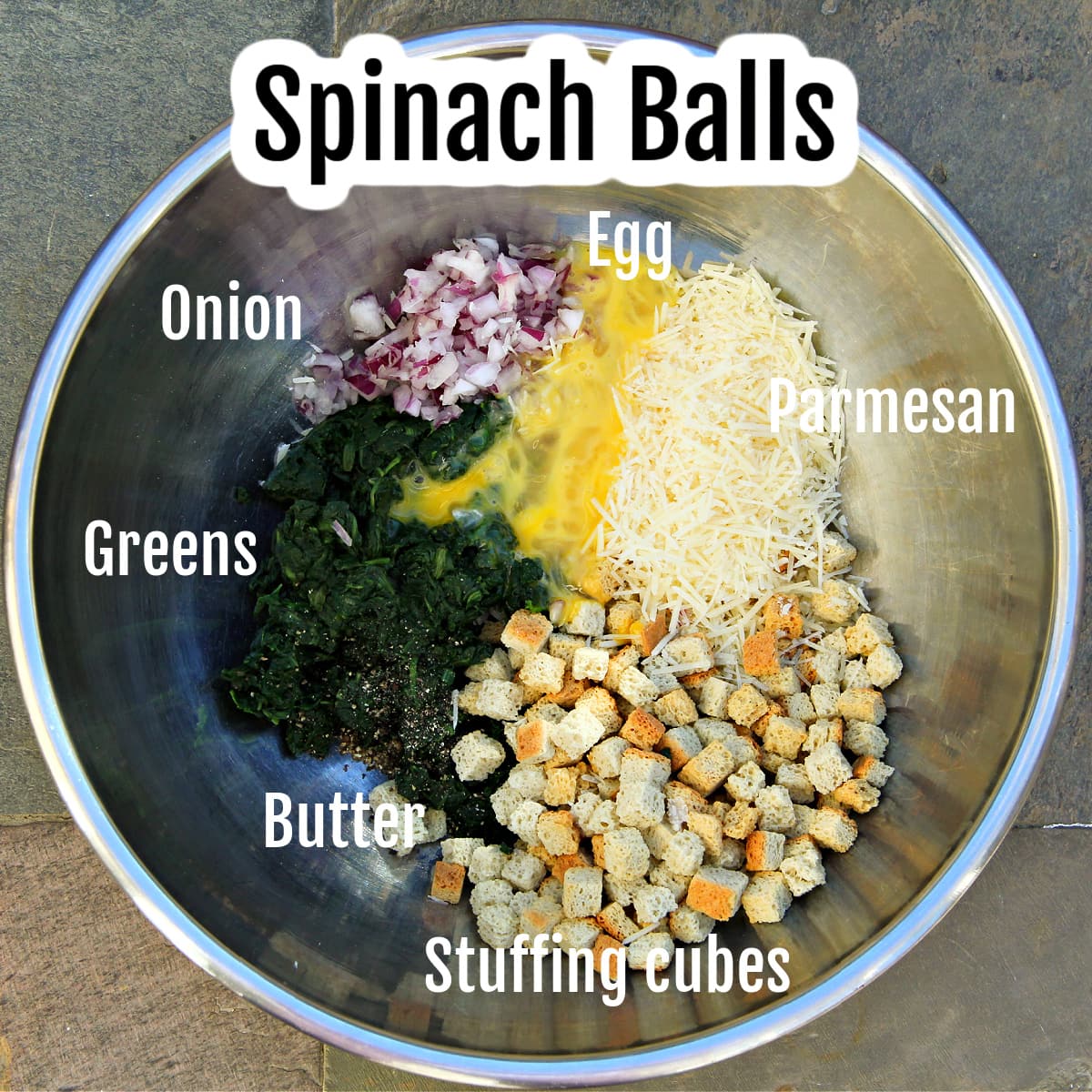 Ingredients for Spinach Balls in a large stainless steel bowl