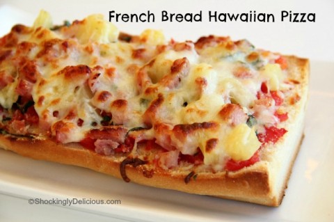 Baked piece of French Bread Hawaiian Pizza out of the oven