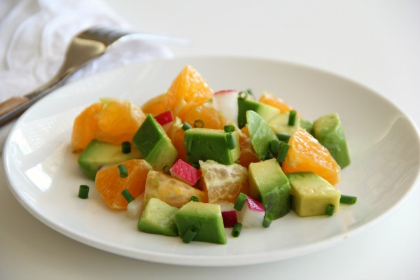 Pixie Dust Salad: California-style salad in which creamy avocado meets super sweet Ojai Pixie tangerines and crunchy radishes in the presence of cumin and chives and vanilla salad dressing. Magic ensues!