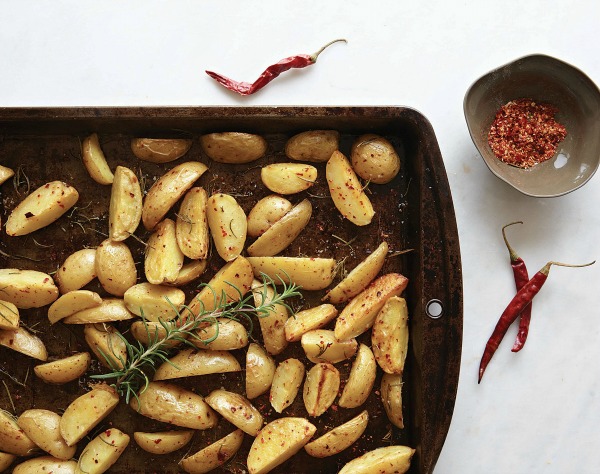 Chile Roasted Potatoes on a dark baking sheet