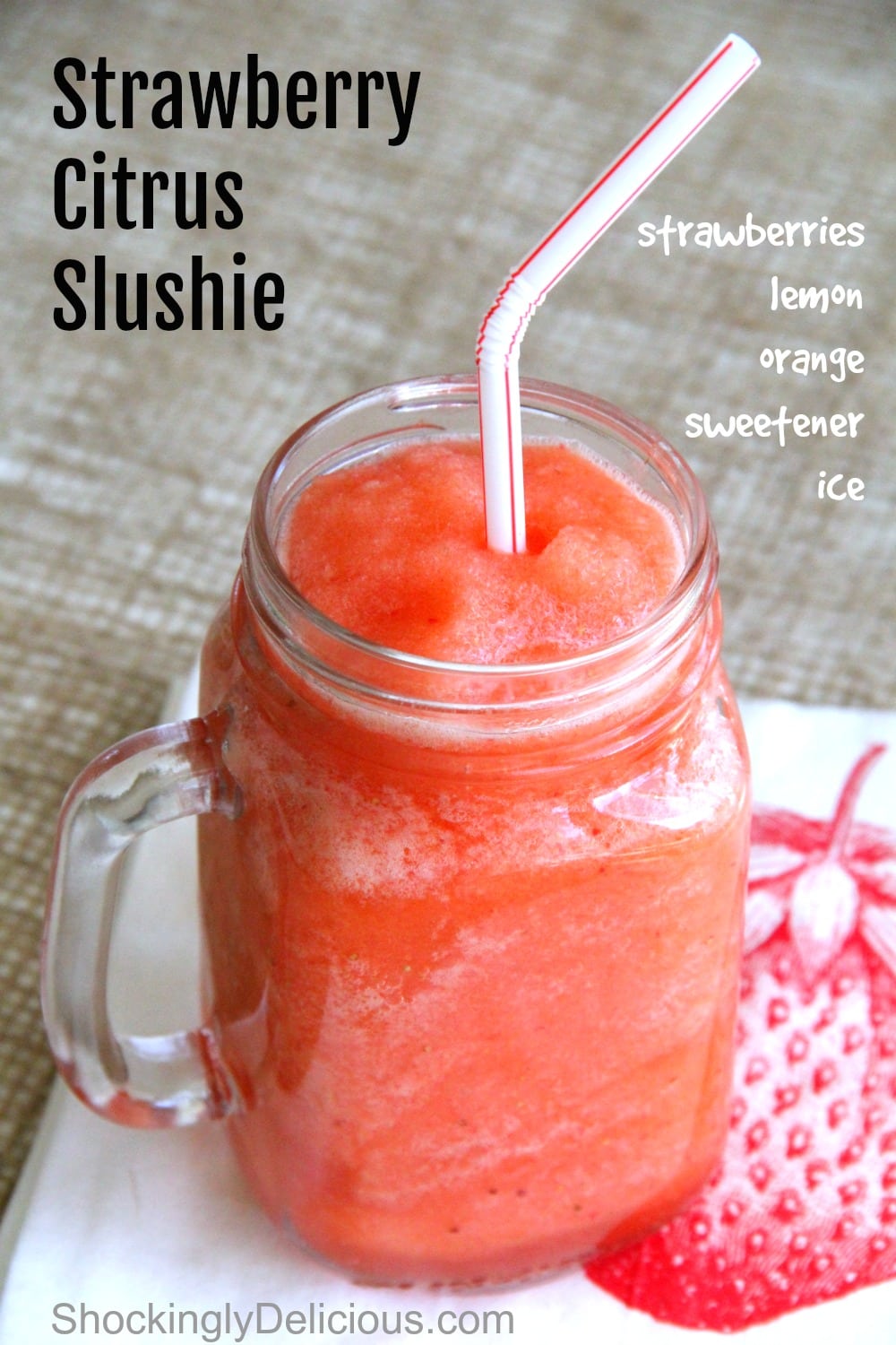 Strawberry Citrus Slushie in a glass mug with striped straw on ShockinglyDelicious.com