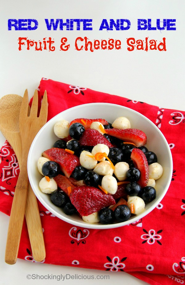 Red, White and Blue Fruit and Cheese Salad in a white bowl on a red bandana | ShockinglyDelicious.com