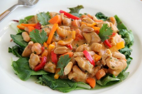 Creamy Peanut Chicken Over Greens |ShockinglyDelicious.com