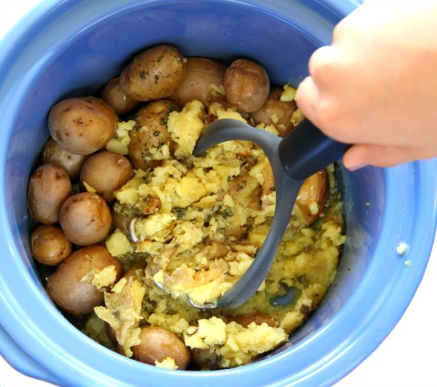 Use a potato masher for Slow Cooker Rustic Mashed Potatoes on ShockinglyDelicious.com