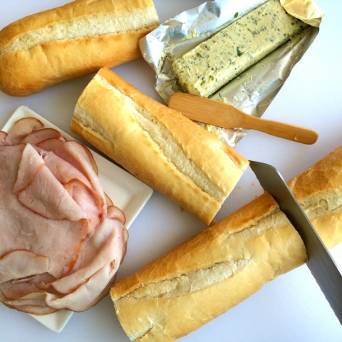 Cutting bread for French Ham and Butter Sandwich on ShockinglyDelicious.com