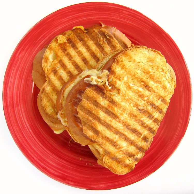 Dubliner Grilled Cheese Sandwich on a red plate on ShockinglyDelicious.com