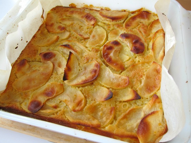 Custardy Apple Squares in a white baking dish