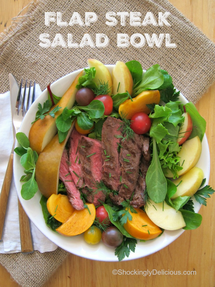Flap Steak Salad Bowl on a burlap placemat on ShockinglyDelicious.com
