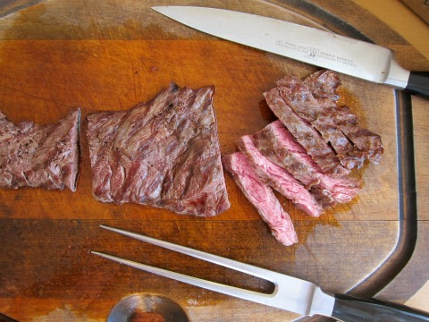 Flap Steak is sliced against the grain after grilling on ShockinglyDelicious.com