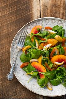 Arugula with Fresh Golden Dates, Dried Apricots, Nectarines and Sumac