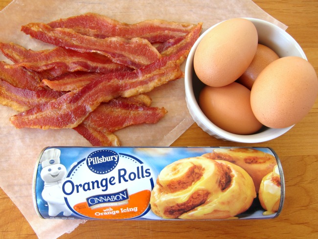 Assembling ingredients for Bacon-Orange Breakfast Sandwiches on ShockinglyDelicious.com