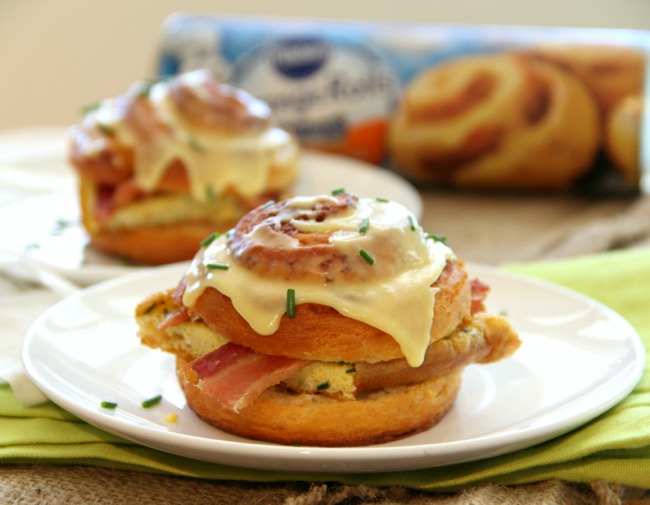 Easy breakfast sandwich stuffed with bacon and chive-flavored eggs, encased in a split sweet orange roll. What a way to start the day!