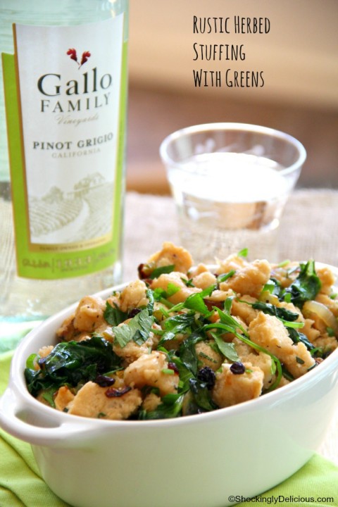 A good loaf of day-old sourdough is the starter for this vegan Thanksgiving stuffing chock full of fresh green herbs and kale, on ShockinglyDelicious.com 