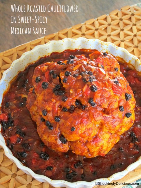 Vegetarian Whole Roasted Cauliflower in Spicy-Sweet Mexican Sauce recipe on ShockinglyDelicious.com