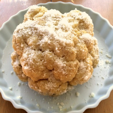 Whole Cauliflower gets an egg wash and then Parmesan coating on ShockinglyDelicious.com