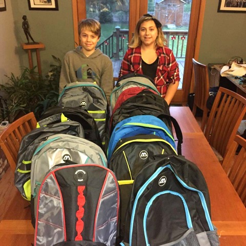 Luke and his cousin Lily make backpacks for homeless