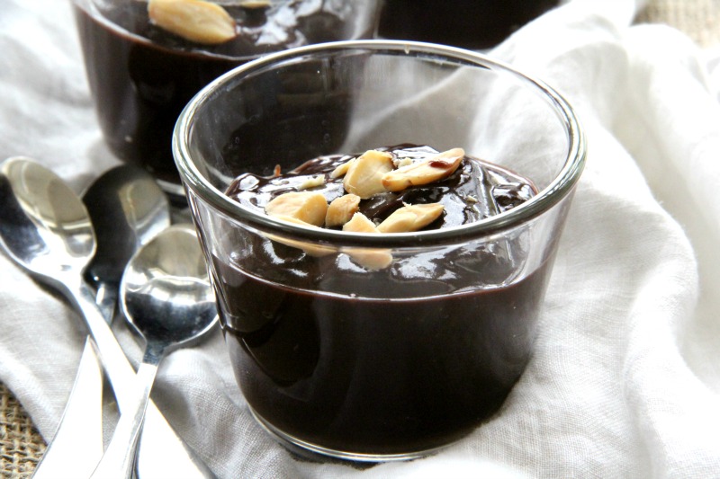 Chocolate Pudding in a glass cup with peanuts on top