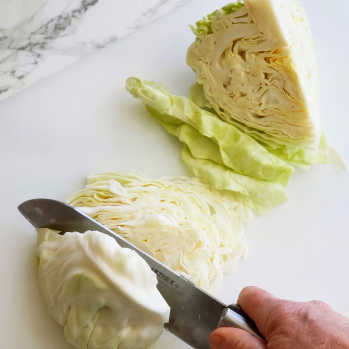 Slice the cabbage finely on ShockinglyDelicious.com