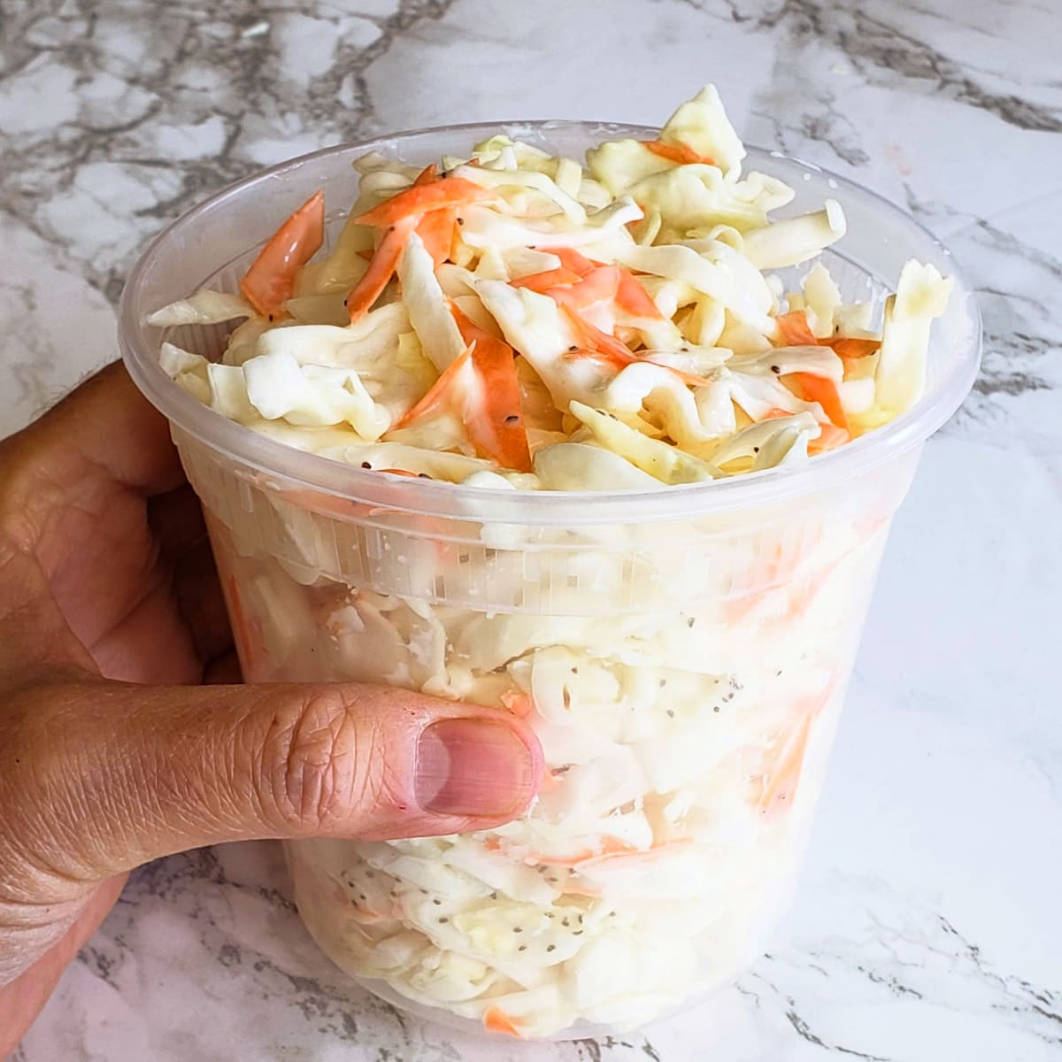 Store Chick-fil-A Cole Slaw in a takeout container on ShockinglyDelicious.com