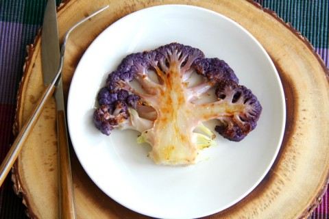 Purple Cauliflower Steaks: Roasting brings out the best caramelized flavors in a simple head of cauliflower dressed with olive oil and salt. You won't want to share. Paleo, vegan, low-carb, low-calorie, diabetic-friendly. It's all the things.| ShockinglyDelicious.com