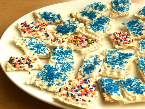 Addictive, sweet and crunchy White Chocolate Matzo Treats are an easy dessert treat for Passover. Sprinkles make everything better | ShockinglyDelicious.com