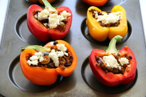 Queso Fresco on top of Picadillo Stuffed Peppers on ShockinglyDelicious.com