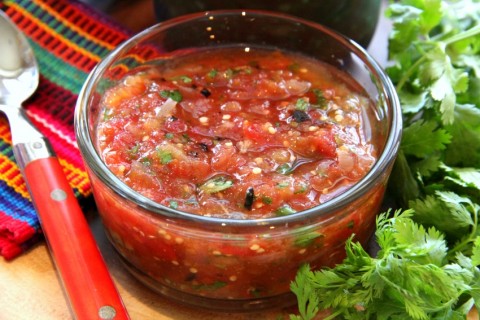 Authentic Mexican chunky tomato salsa has roasted tomatillos, onions and garlic, along with heat from chiles de arbol. Use it on everything! | ShockinglyDelicious.com