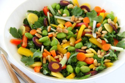A sprightly, refreshing, gorgeous Chopped Thai Kale Salad, with lots of color, texture and nutrition from the vegetables and a punch of garlicky-gingery-sesame flavor from the dressing.
