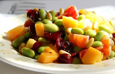 Fruity, vegan Edamame Salad with Persimmon, Peppers and Pine Nuts is a light lunch or side salad full of flavor, crunch and nutrition. Bonus: it's rainbow eye candy, too!